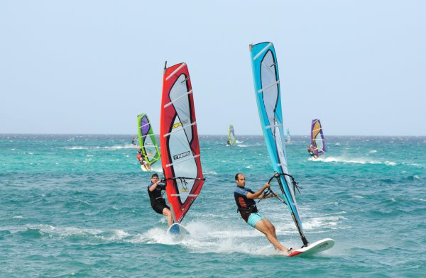 Windsurfing, along with water skiing, rowing, surfing and kite surfing, and canoeing, are some popular water sports in Spain.