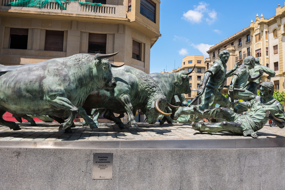 Monumento al Encierro (Bull Run Monument) in Pamplona honors the bull runners of the San Fermin Festival.