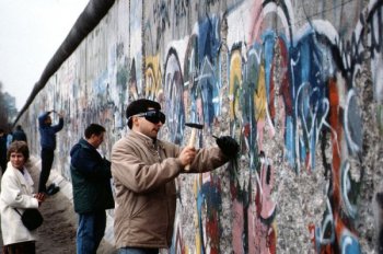 West German citizens begin chipping away at the Berlin Wall, November, 1989