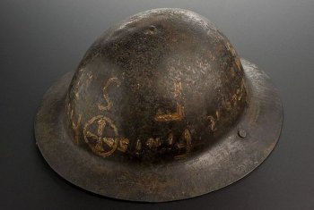 Steel helmet possibly belonging to a French Red Cross worker during WWI, circa 1914-1918