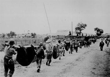 The Bataan Death March kills about 10,000 Filipinos and 1,200 Americans.