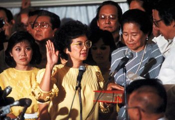 Corazon Aquino assumes the presidency.