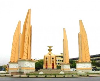 A representation of the 1932 constitution sits in the golden bowl of the Democracy Monument in Bangkok