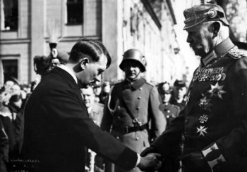 Adolf Hitler, left, and President Hindenburg in 1933 months after Hitler is appointed chancellor of Germany