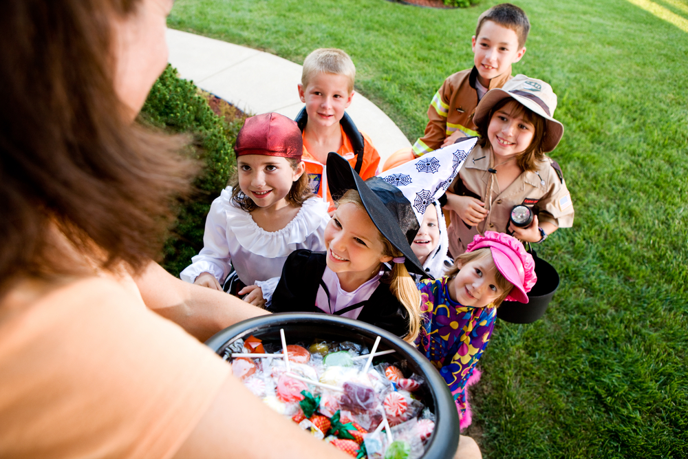 On Halloween, children dress in costumes and go trick-or-treating.