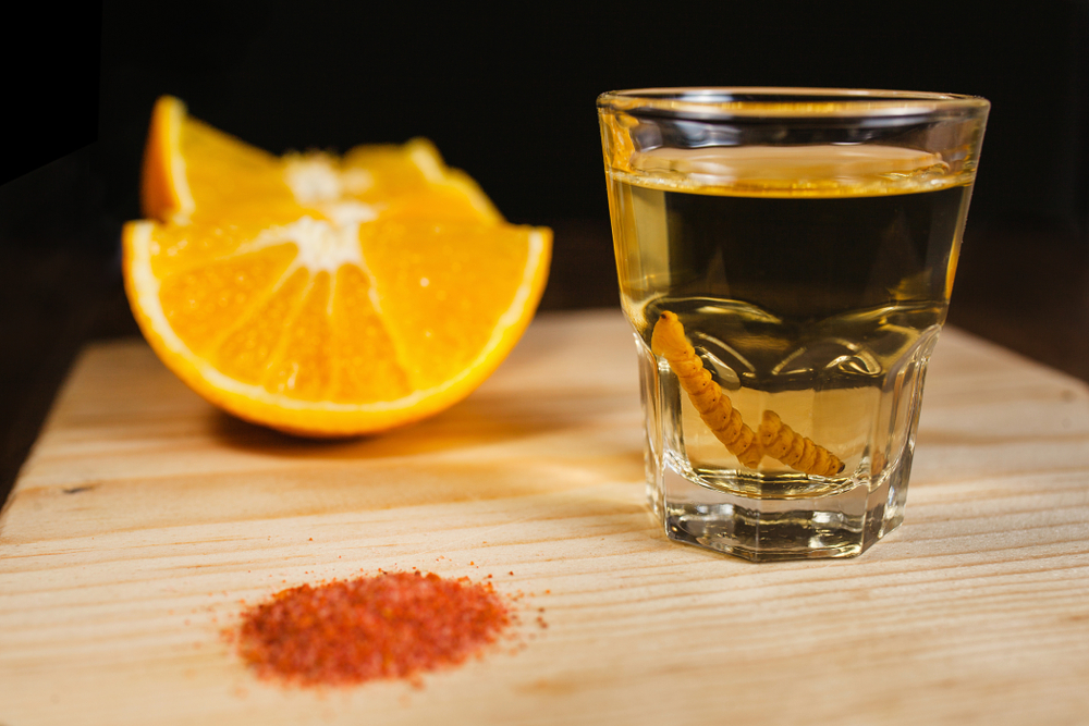A slice of orange commonly accompanies mezcal, as does a chile-seasoned salt known as 'worm salt.'
